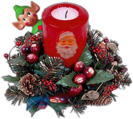 Christmas arrangement with Santa, elf, candle, holly, pine cones